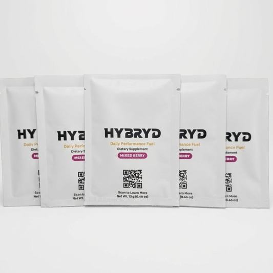Five HYBRYD Daily Performance Fuel supplement packets on a white background